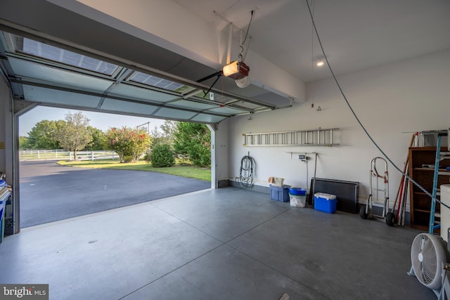 garage featuring a garage door opener