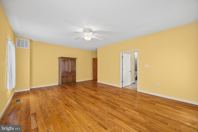 unfurnished bedroom featuring ceiling fan and light wood-type flooring