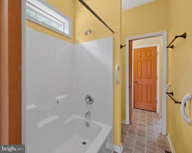 bathroom with shower / bathtub combination and tile patterned floors