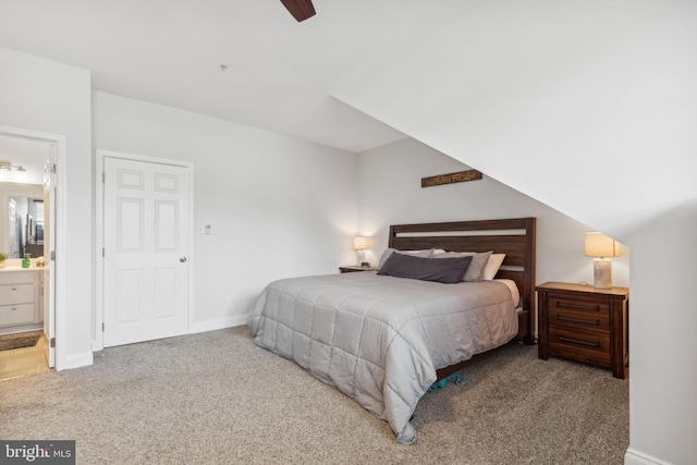 bedroom featuring ceiling fan, carpet floors, and connected bathroom