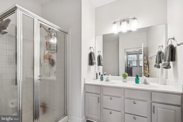 bathroom featuring vanity and walk in shower