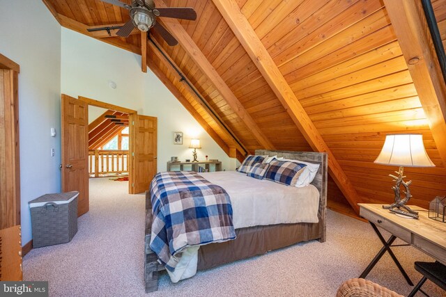 carpeted bedroom with wooden ceiling, lofted ceiling with beams, and ceiling fan