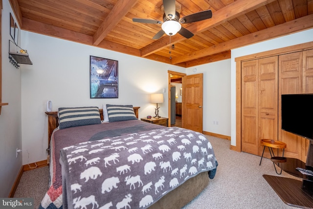 bedroom with wood ceiling, ceiling fan, beamed ceiling, and carpet floors