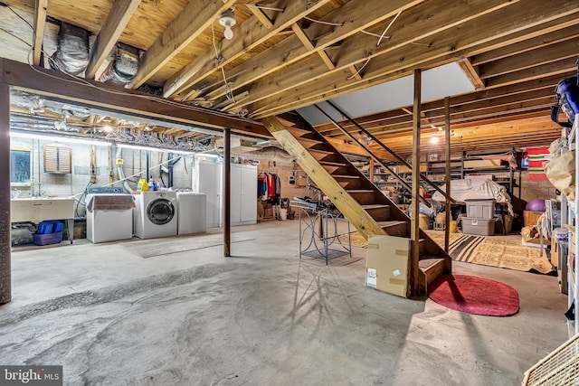 basement featuring separate washer and dryer