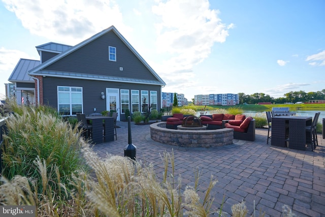 view of patio featuring a fire pit