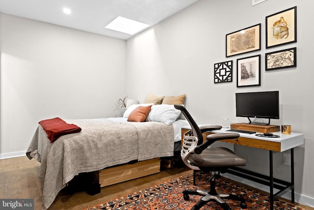 bedroom featuring hardwood / wood-style floors