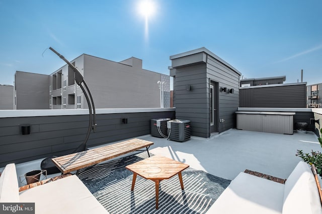 view of patio / terrace with central AC unit