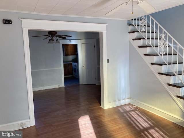 interior space featuring ceiling fan, hardwood / wood-style flooring, and crown molding