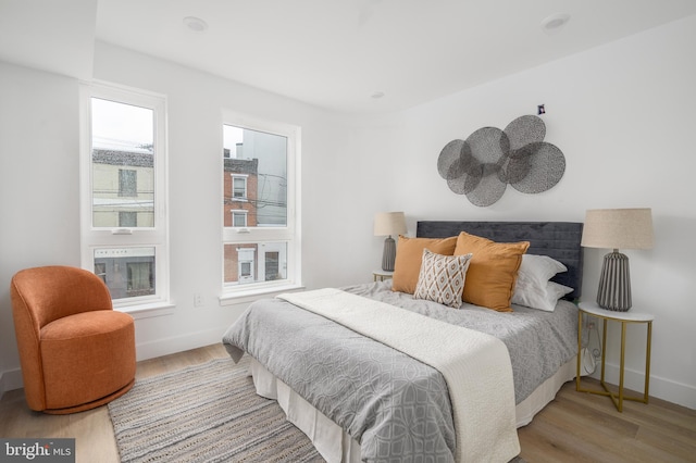 bedroom with light wood-type flooring