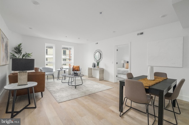 dining room featuring light hardwood / wood-style flooring