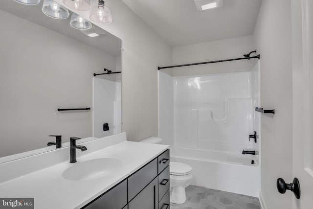 bathroom with shower / tub combination, vanity, and toilet