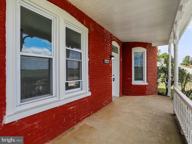 view of patio featuring a porch