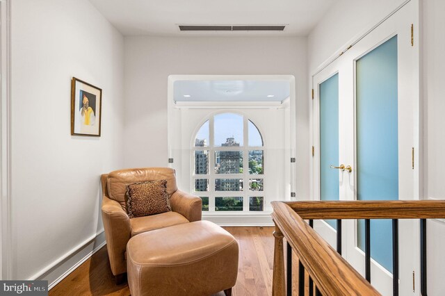 sitting room with light wood-type flooring