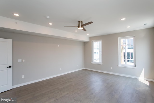 unfurnished room featuring hardwood / wood-style flooring and ceiling fan