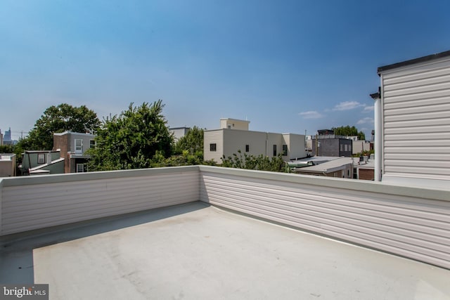 view of patio with a balcony