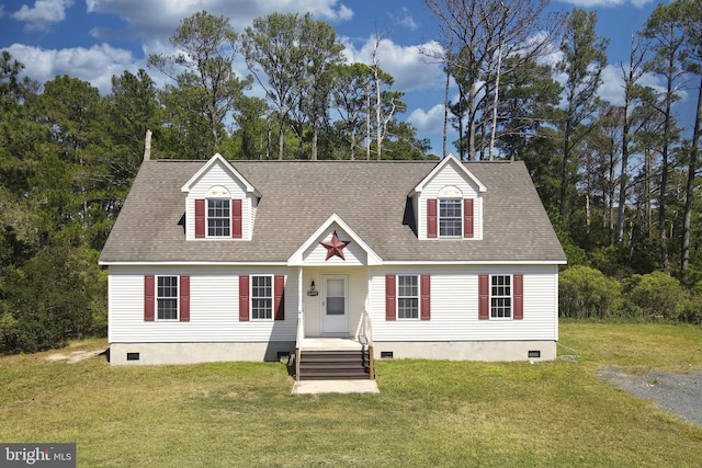 new england style home featuring a front lawn