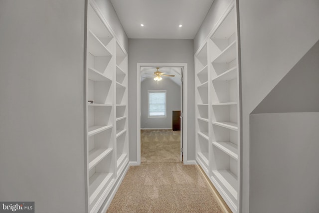 corridor featuring recessed lighting, baseboards, and light colored carpet