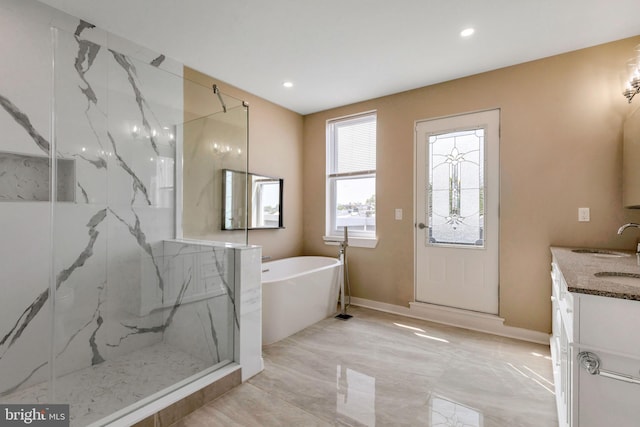 bathroom with tile patterned floors, separate shower and tub, and vanity