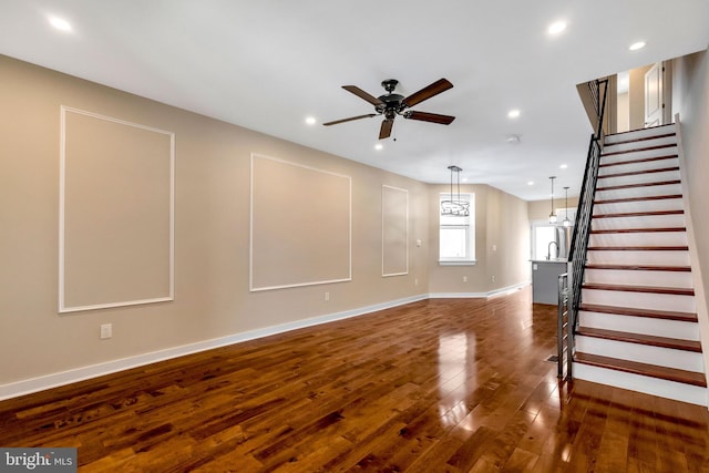 interior space with hardwood / wood-style flooring and ceiling fan