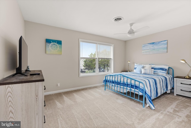 bedroom featuring visible vents, ceiling fan, baseboards, and carpet