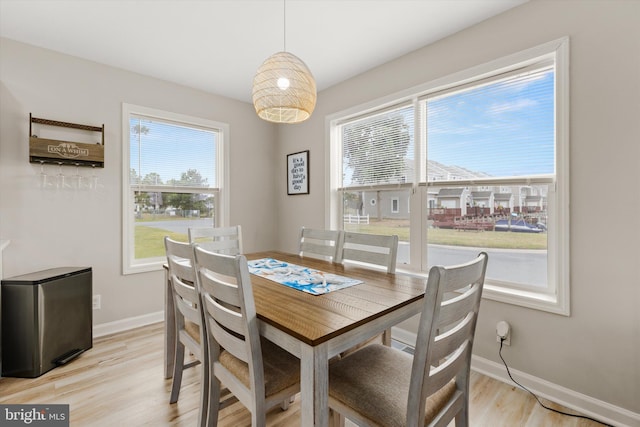 dining room featuring light hardwood / wood-style floors