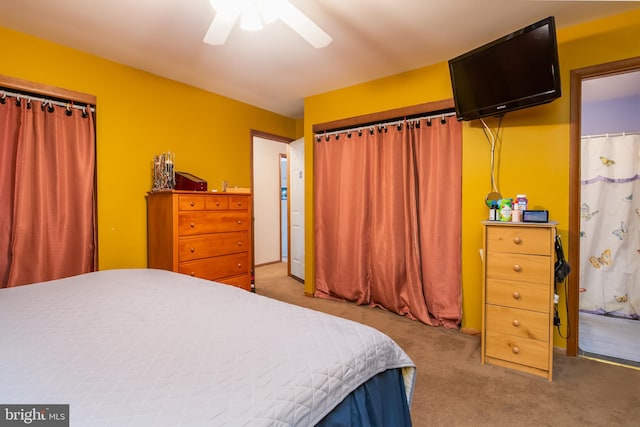 bedroom featuring a closet, carpet, and ceiling fan