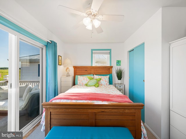 bedroom with ceiling fan and carpet floors