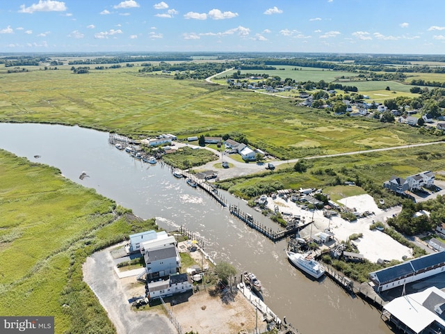 drone / aerial view featuring a water view and a rural view