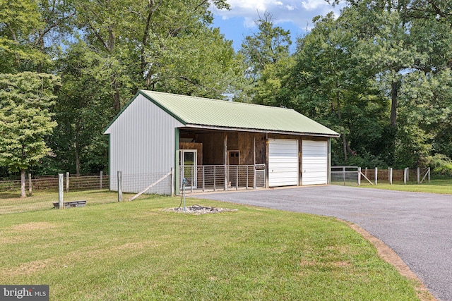 garage with a yard