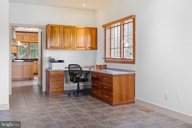 tiled home office with sink