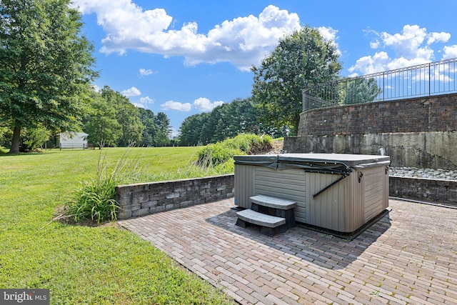 view of patio with a hot tub