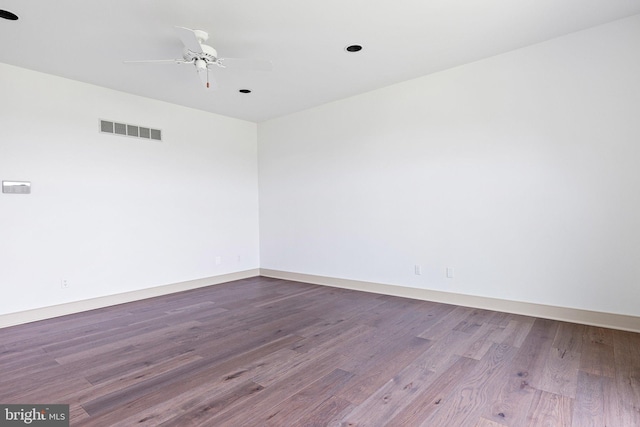 unfurnished room featuring ceiling fan and hardwood / wood-style floors