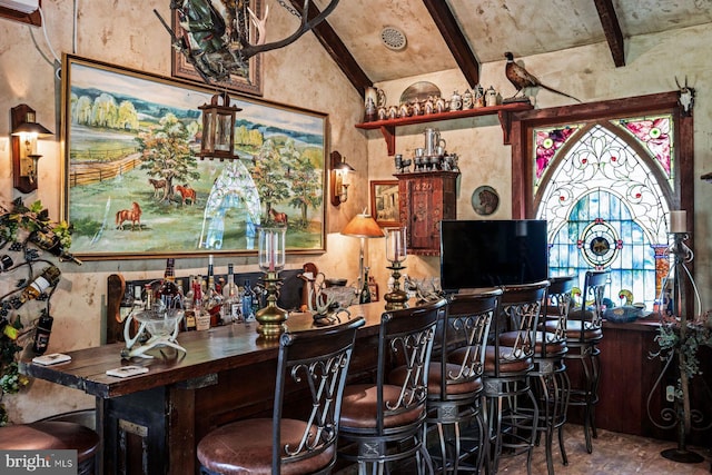 bar with vaulted ceiling with beams