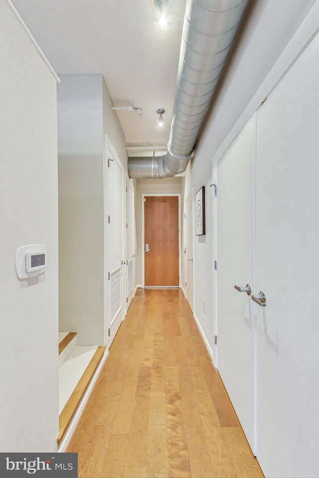 hallway featuring light hardwood / wood-style floors