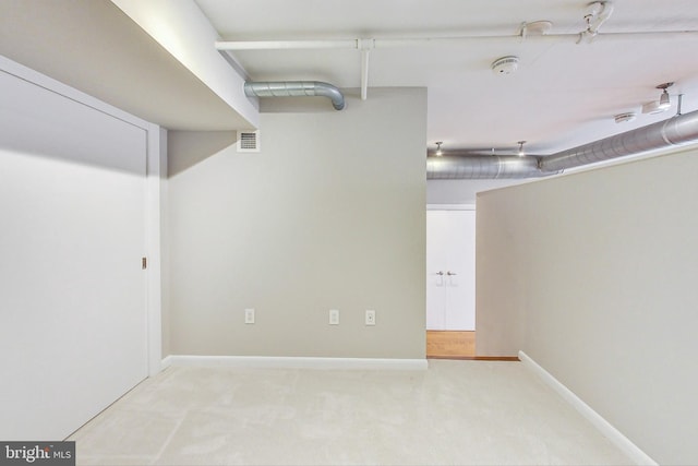 basement featuring carpet