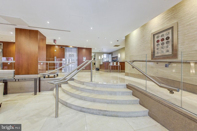 stairs with tile patterned flooring