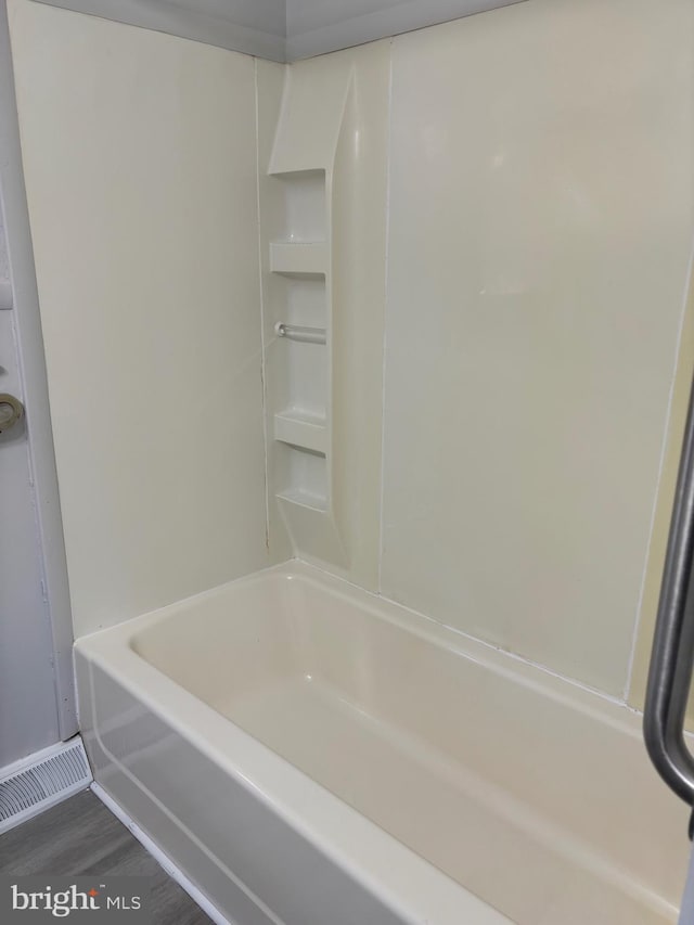 bathroom featuring hardwood / wood-style flooring