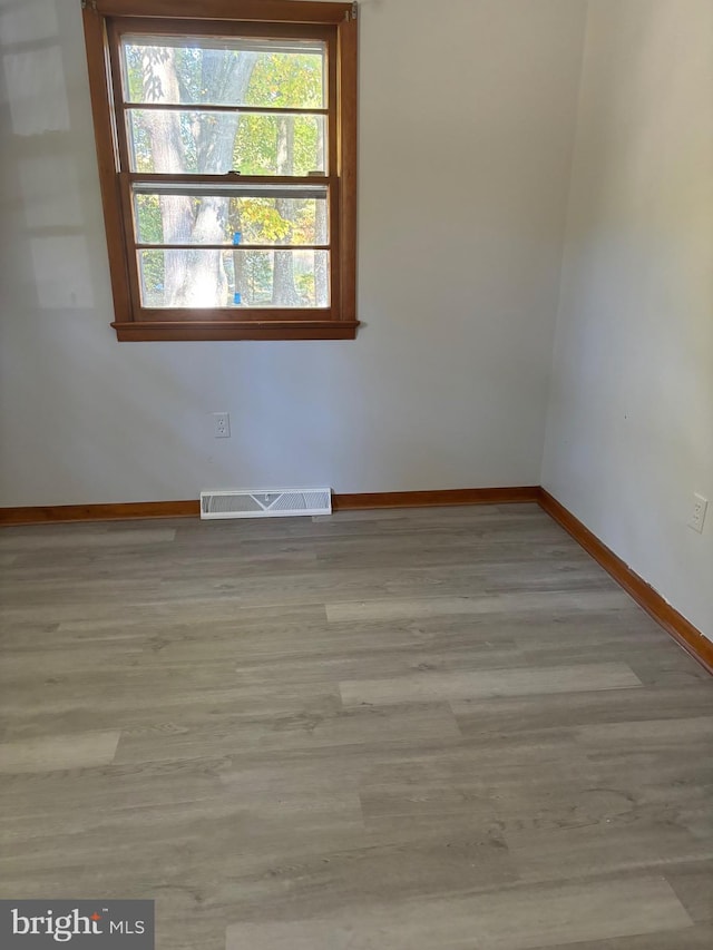 empty room featuring light hardwood / wood-style floors