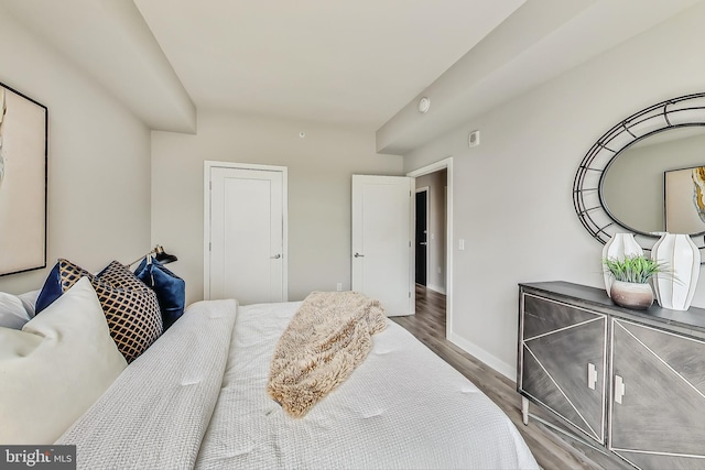 bedroom featuring hardwood / wood-style floors