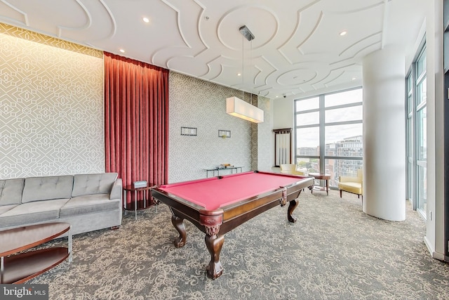 rec room with carpet, a wall of windows, and billiards