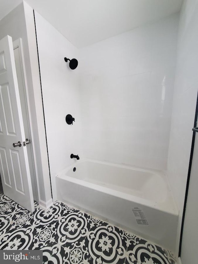 bathroom with tile patterned flooring and shower / bathing tub combination