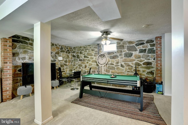 recreation room with ceiling fan, light carpet, a textured ceiling, and pool table