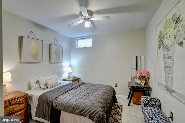 tiled bedroom featuring ceiling fan