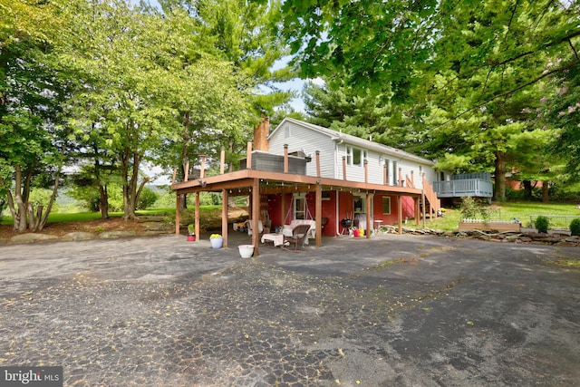 view of front of house featuring a deck