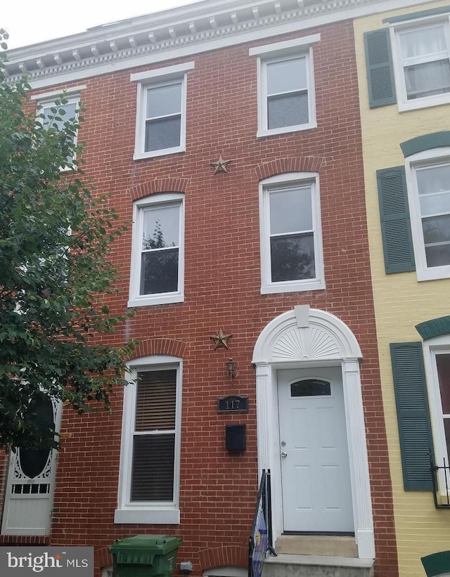 view of front of property with brick siding