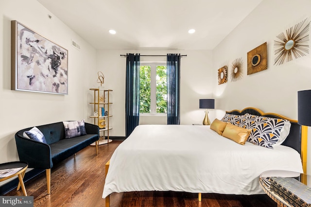 bedroom featuring hardwood / wood-style floors