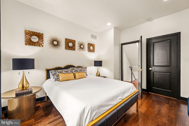 bedroom with wood-type flooring