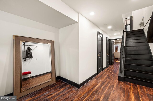 bathroom featuring tile patterned floors, a tile shower, and vanity