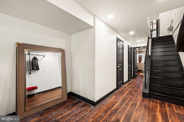 hallway with wood-type flooring