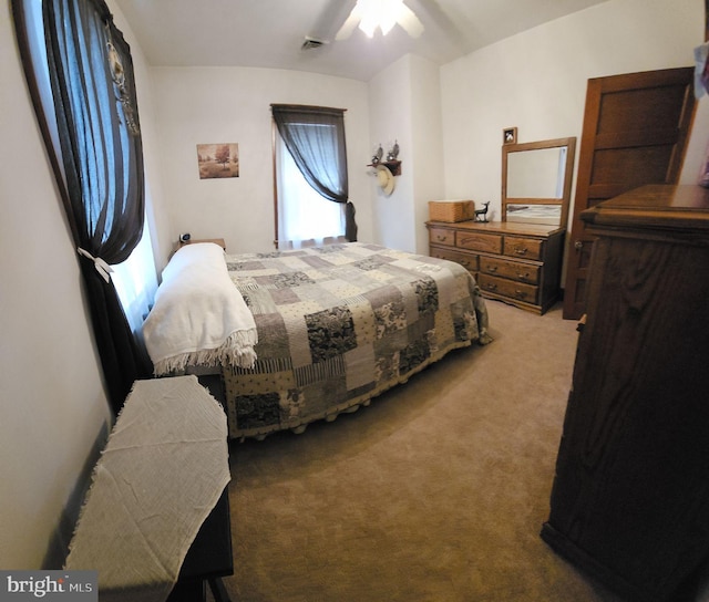 carpeted bedroom with ceiling fan